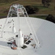 Repair crews working on Deep Space Station 43 in Australia.